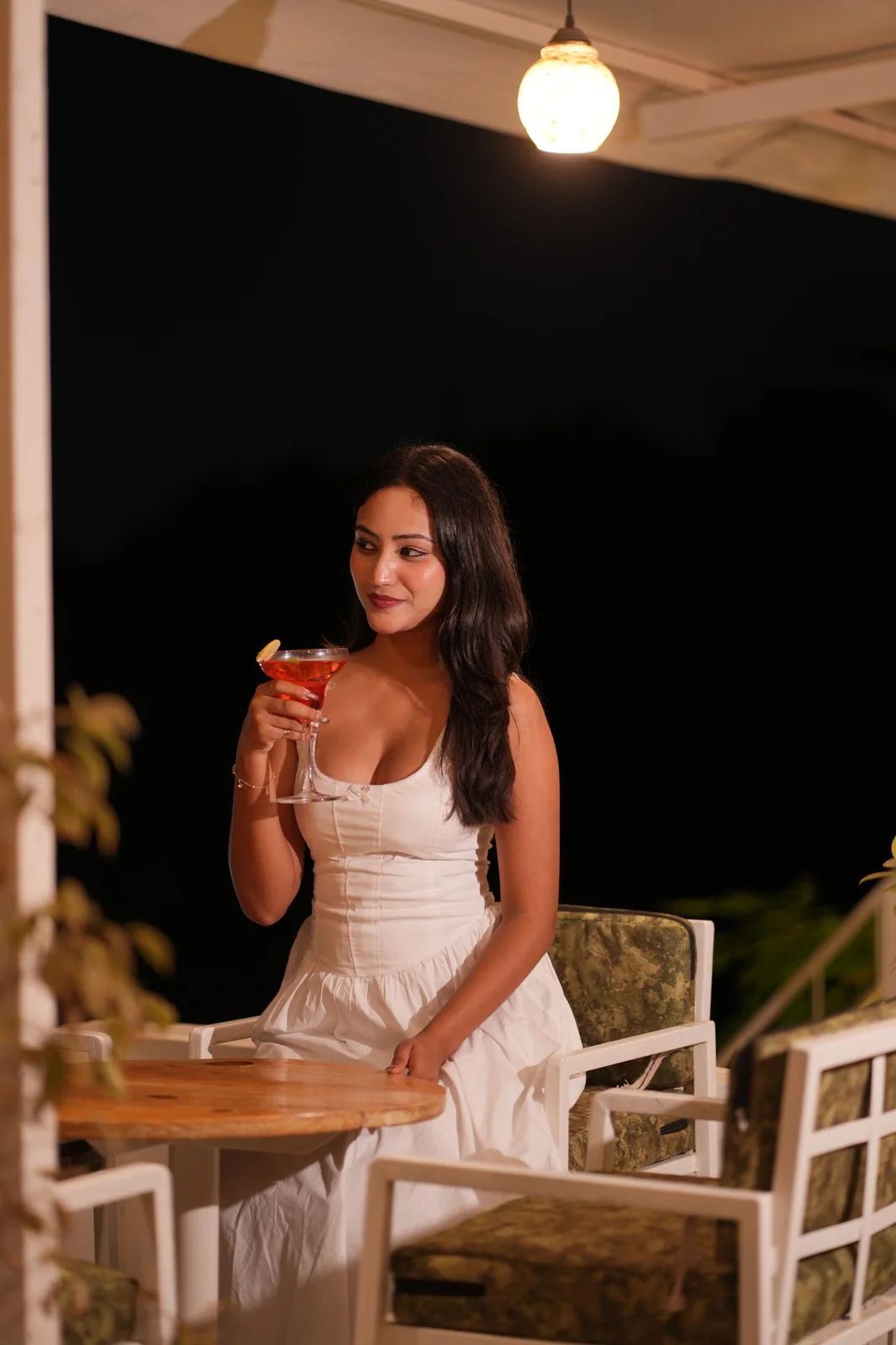 A guest seated at a cafe table with food and drinks. Nasha Chai Sutra, SFS Mansarovar Jaipur.